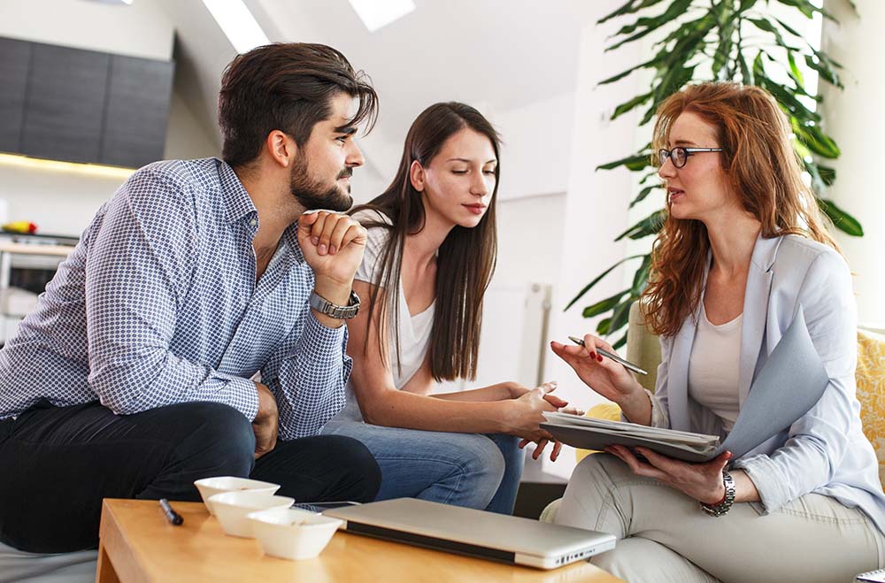Female Real Estate agent offer home ownership and life insurance